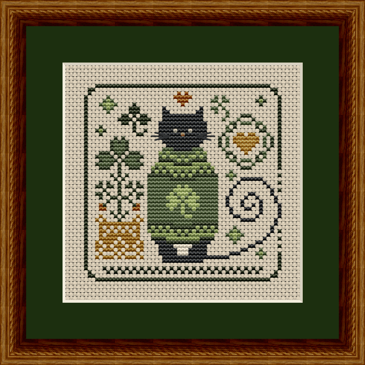 Cat in at Cozy Green Sweater Cross Stitch Pattern from the Cat Tales Collection by Happiness Is HeartMade. Designer Christy Shuhy Ortiz. This whimsical cross stitch pattern has a tuxedo cat surrounded by Celtic style motifs and is a perfect design to stitch for St. Patrick's Day or the month of March. The cat can also be stitched in all black for a black cat appearance.
